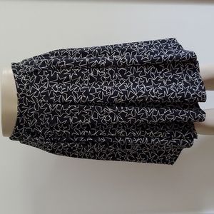 Lularoe black and cream star print, graphic skirt simply comfortable size small